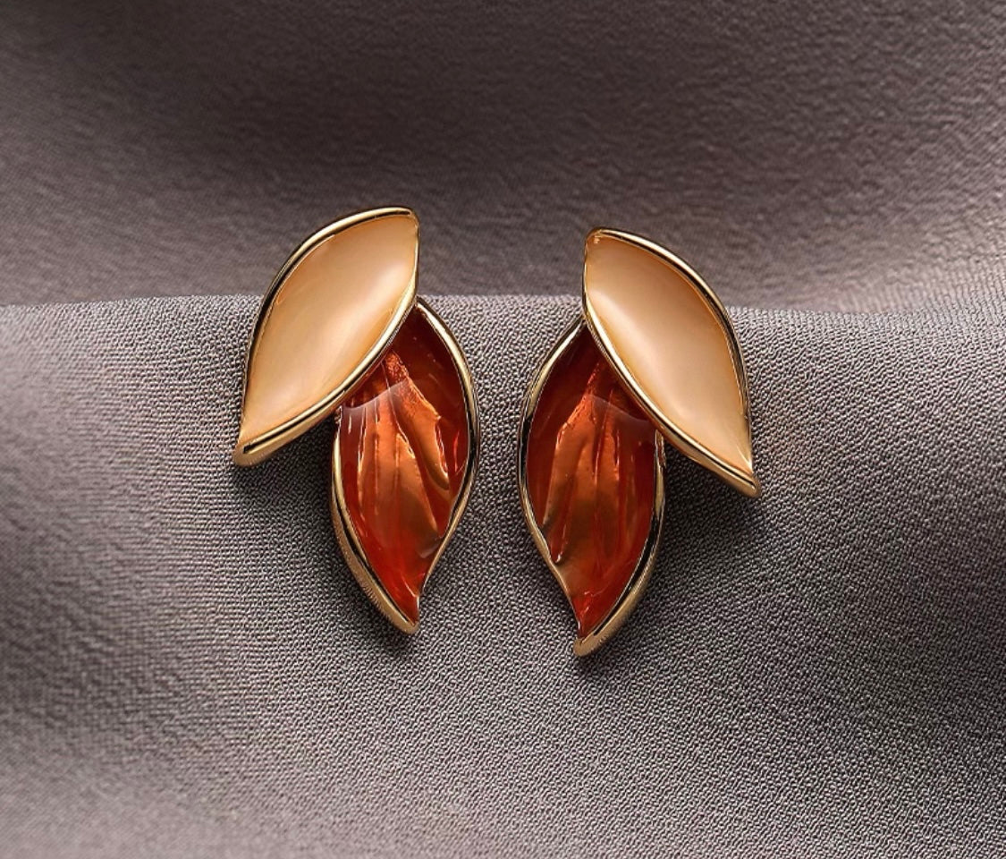 Elegant Statement Earrings – A curated mix of bold, vintage-inspired designs with pearls, florals, and sculptural gold accents, crafted from brass or copper plated with 18k gold and featuring s925 silver needles for comfort