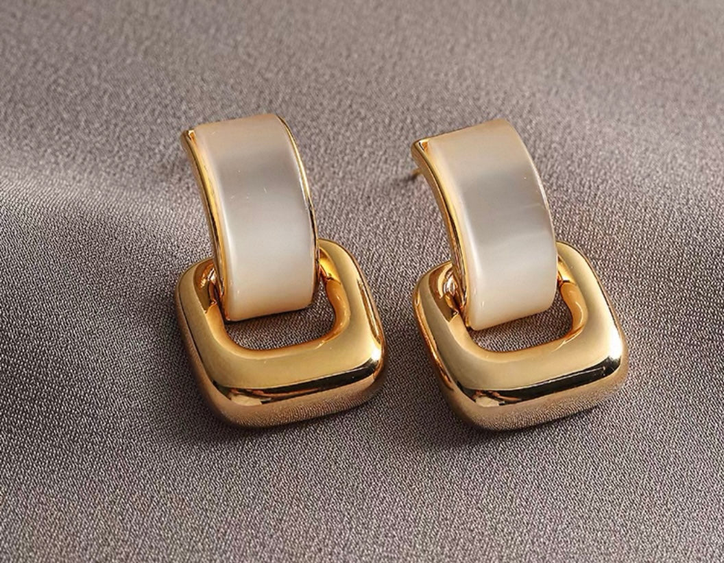 Elegant Statement Earrings – A curated mix of bold, vintage-inspired designs with pearls, florals, and sculptural gold accents, crafted from brass or copper plated with 18k gold and featuring s925 silver needles for comfort