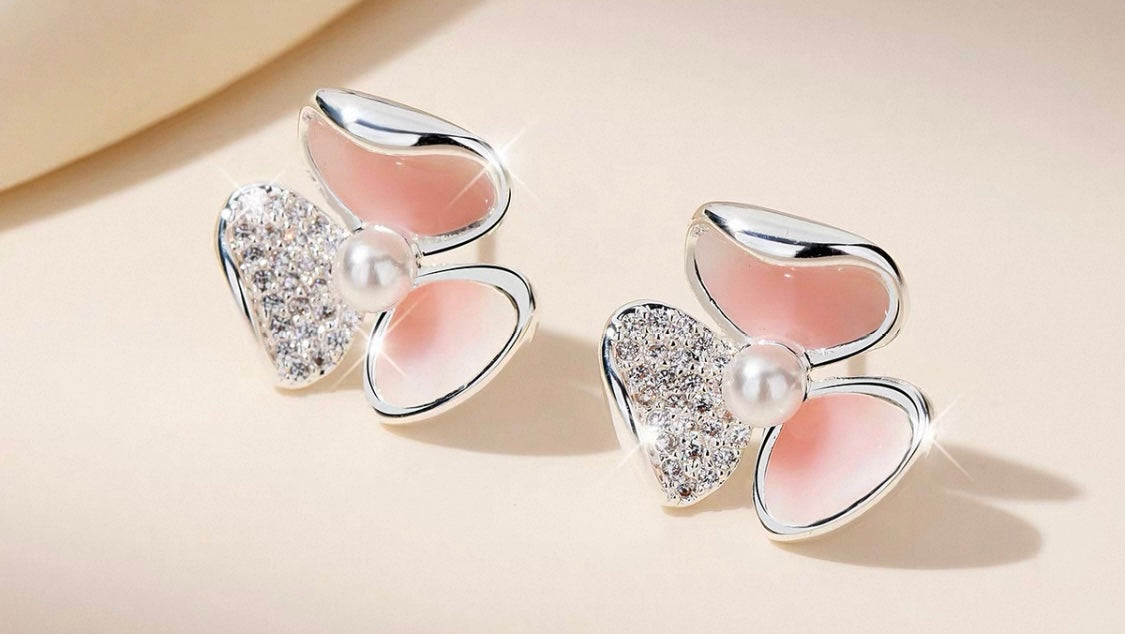 Elegant Statement Earrings – A curated mix of bold, vintage-inspired designs with pearls, florals, and sculptural gold accents, crafted from brass or copper plated with 18k gold and featuring s925 silver needles for comfort