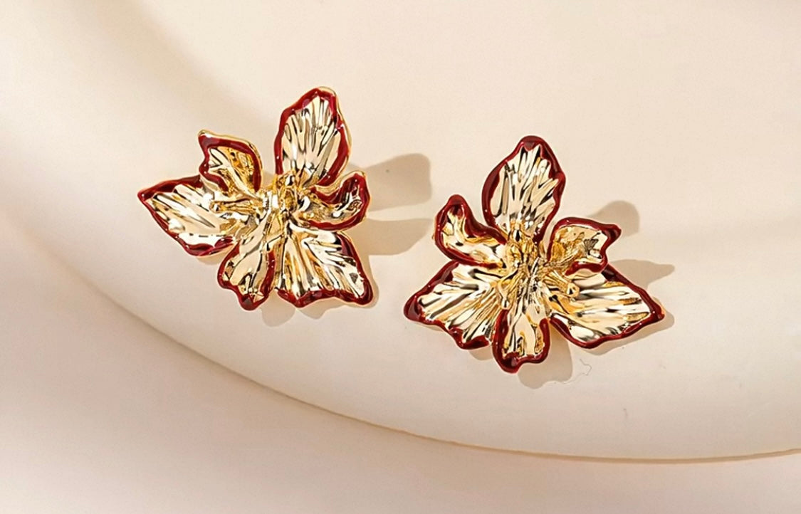 Elegant Statement Earrings – A curated mix of bold, vintage-inspired designs with pearls, florals, and sculptural gold accents, crafted from brass or copper plated with 18k gold and featuring s925 silver needles for comfort