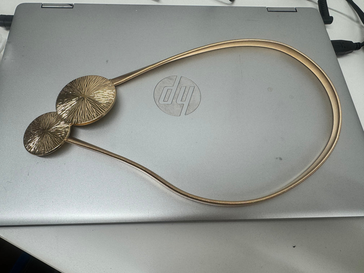 Elegant Elastic Gold Metal Chain Belt with Textured Disc Detail