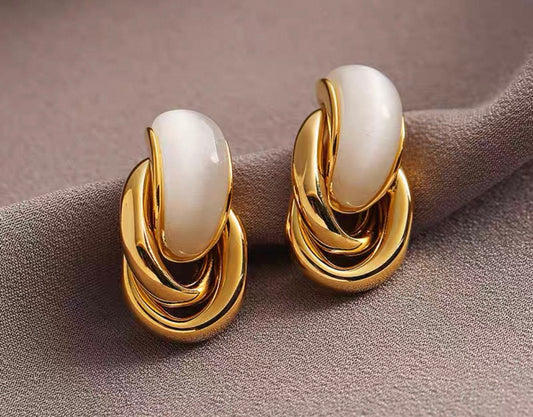 Elegant Statement Earrings – A curated mix of bold, vintage-inspired designs with pearls, florals, and sculptural gold accents, crafted from brass or copper plated with 18k gold and featuring s925 silver needles for comfort
